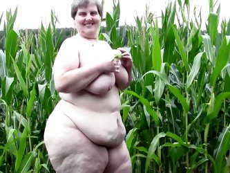 Redneck Whore Tina Is One Of Those BBW With A Lot Of Lust. She's In The Corn Field And Starts Acting Naughty. Her Big, Fat Pussy Needs Some Fucki