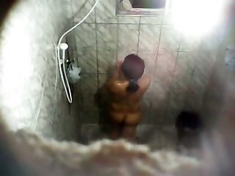 Hot Shower Voyeur Movie Features A Sensual Young Chick With A Smooth Body Soaping Up Her Sexy Tits And Fuckable Booty Unaware That A Voracious Voyeur